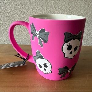 💙Cobwebs & Cauldrons pink soft touch skeleton and bows mug NWT.